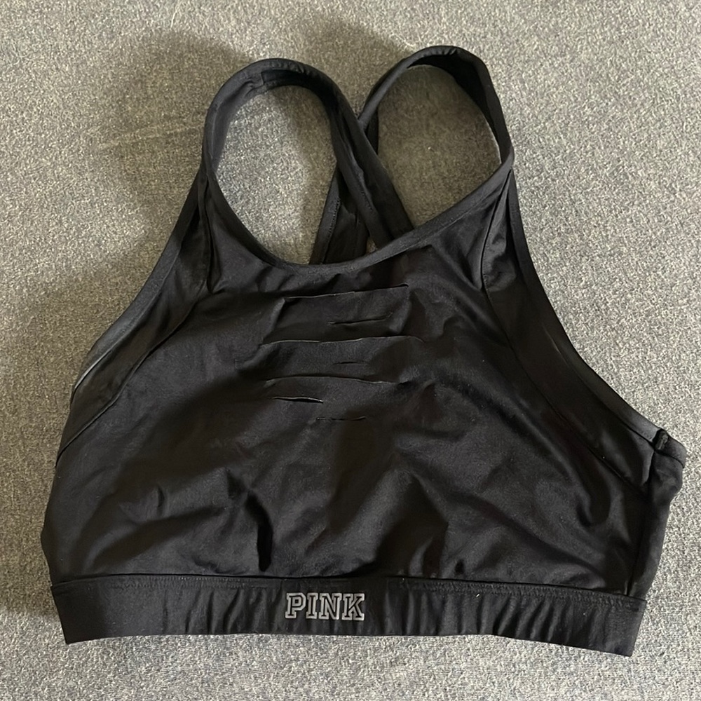 Victoria’s Secret high neck sports bra with cut out details. Great condition